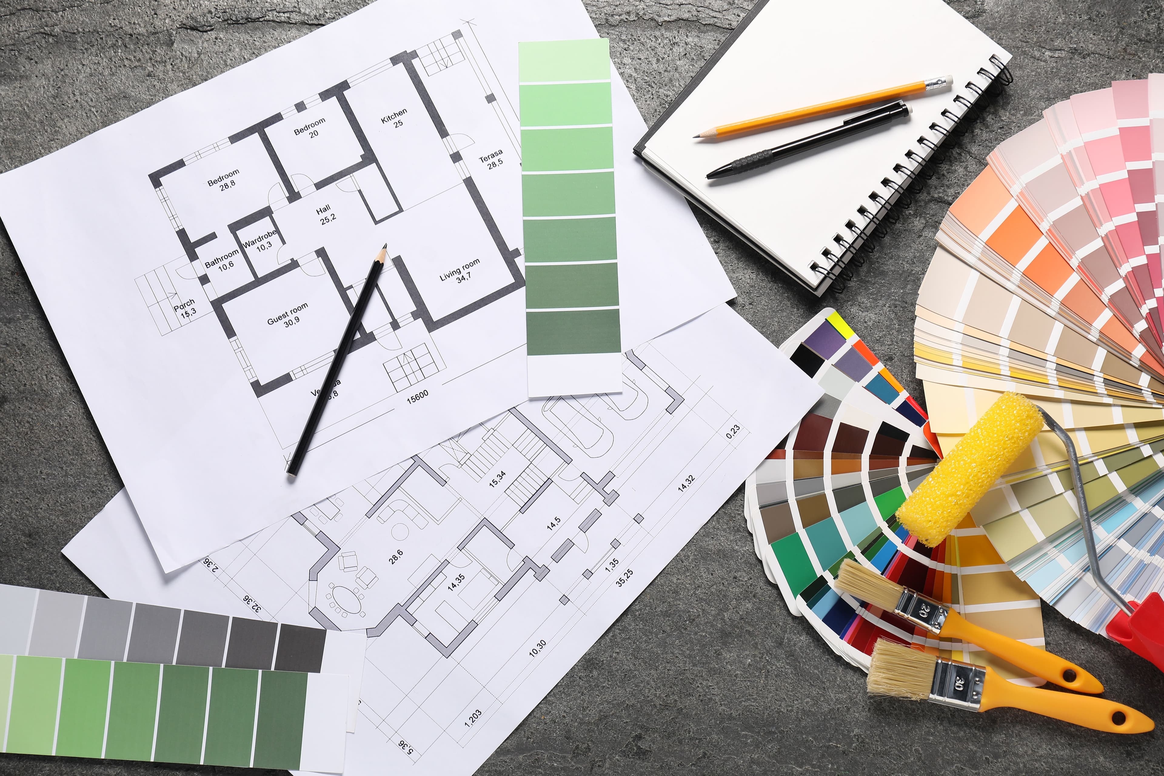House plans and different decorator's tools